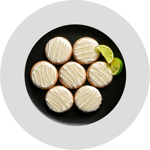 Lime-glazed pastries featuring bright citrus notes, illustrating the baking versatility of Alcirelli’s lime extract — 100% natural, sugar-free, and preservative-free.
